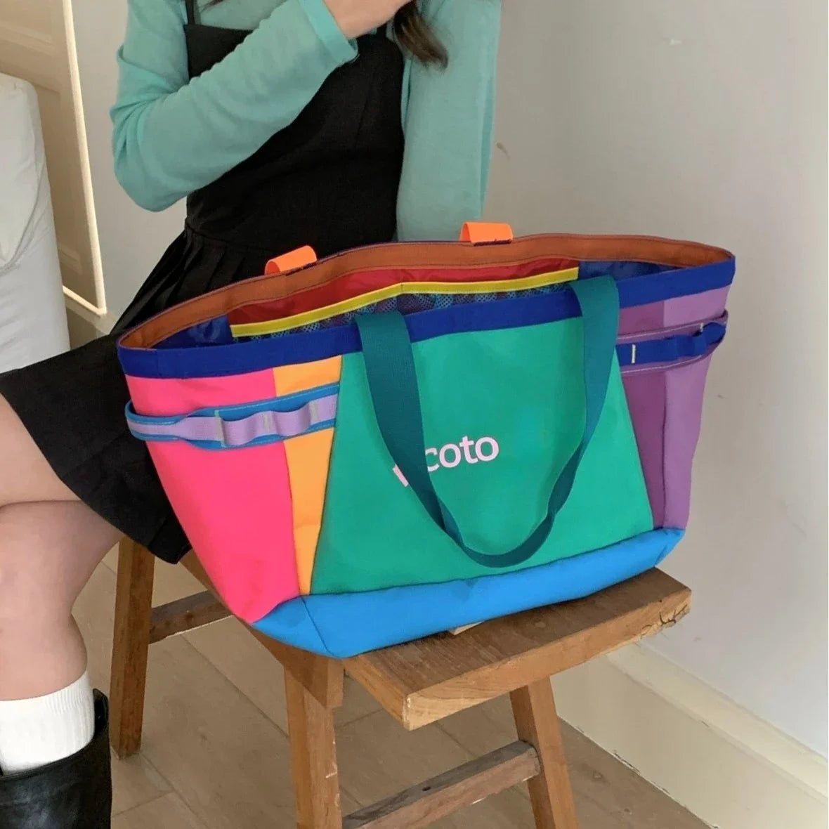 30L rainbow-colored patchwork nylon tote bag, large capacity with multiple side pockets, lightweight shoulder bag, suitable for shopping, travel, and daily outdoor activities.