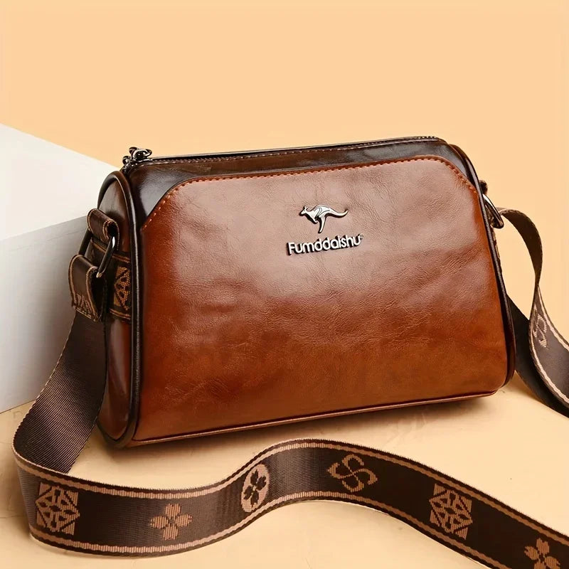 Vintage White Black Crossbody Bag with Retro Brown Monogram Strap Spacious Versatile Stylish for City Strolls and Casual Outings