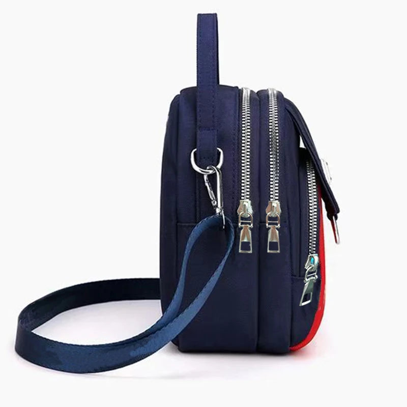 Neutral Style Shoulder Bag for Men and Women, Suitable for Travel and Photography It Is a Cross-Body Bag Made of Oxford Fabric.