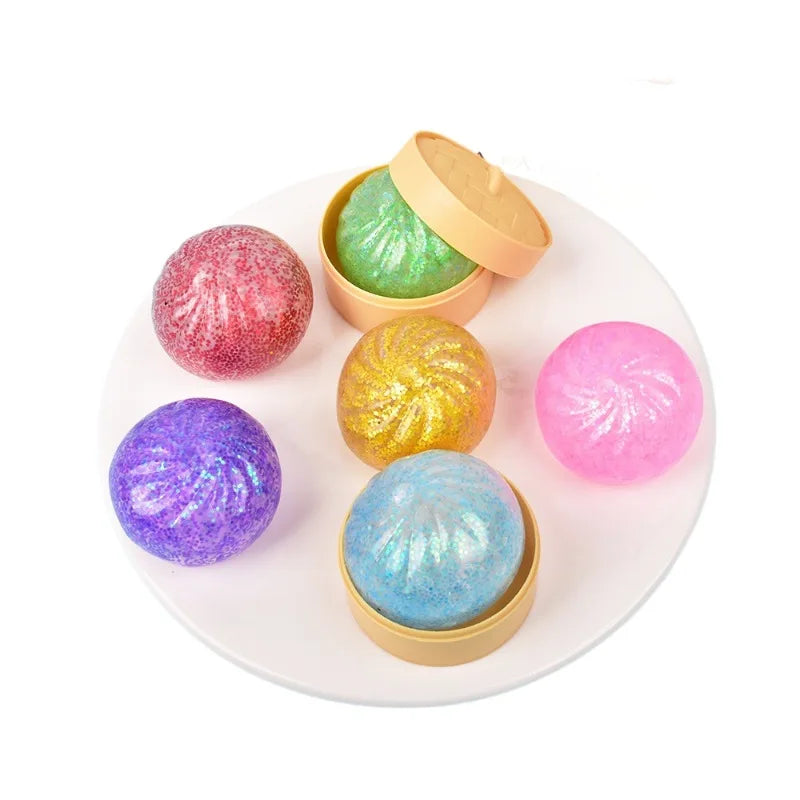 Hot 2026 Decompression toy glitter colored bun shaped venting ball, dumping bun squeezing decompression ball