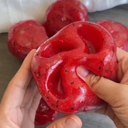 A soft toy in the style of watermelon sauce, with a slow shape recovery and realistic fruit, suitable for making gifts.