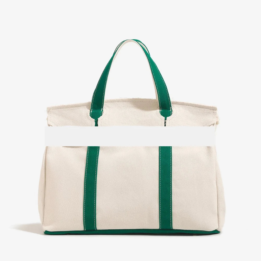 Canvas bag for women 2026 new high-end and niche design, contrasting color handbag, large capacity commuting versatile bag