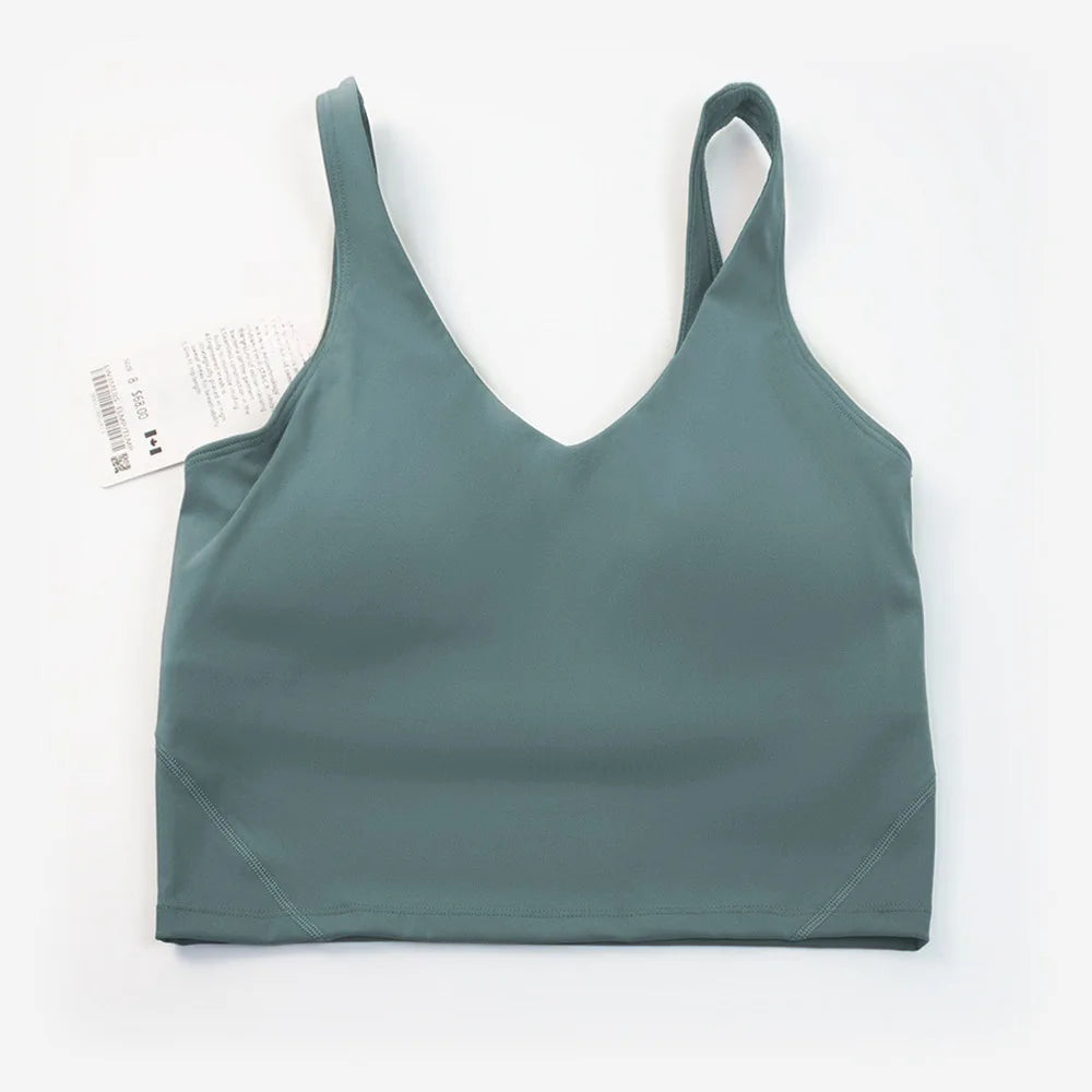 Women's yoga vest with U-shaped straps and built-in breast pads, offering a bare-skin feel suitable for fitness and exercise.