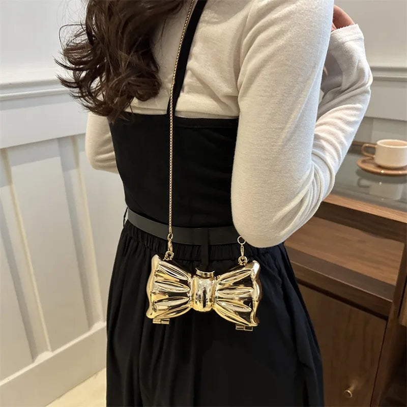 Metallic Gold 3D Bow Shaped Mini Hard Case Crossbody Bag, Glossy Mirror Surface Metal Clutch with Detachable Oval Link Chain Strap, Cute Luxury Evening Micro Handbag for Lipstick Small Accessories