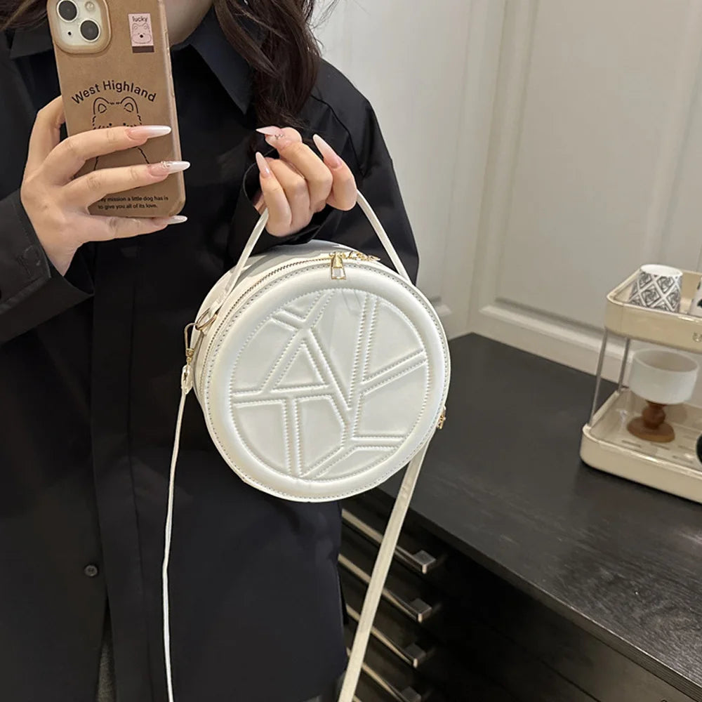 Solid color hand-held small round bag 2025 new bag, women's fashion shoulder bag, casual personalized crossbody bag