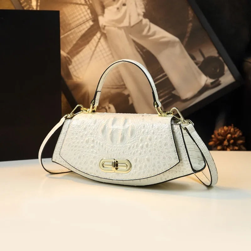 Women's saddle bag 2026, high-end leather small bag, new fashionable style, trendy and stylish, handheld messenger bag