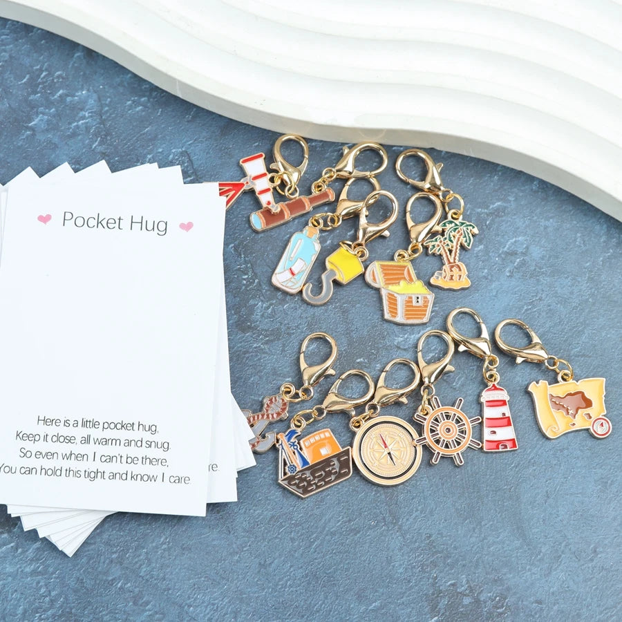 12pcs cartoon nautical treasure hunt keychain items, including a pocket-sized greeting card, with accessories such as ropes, map