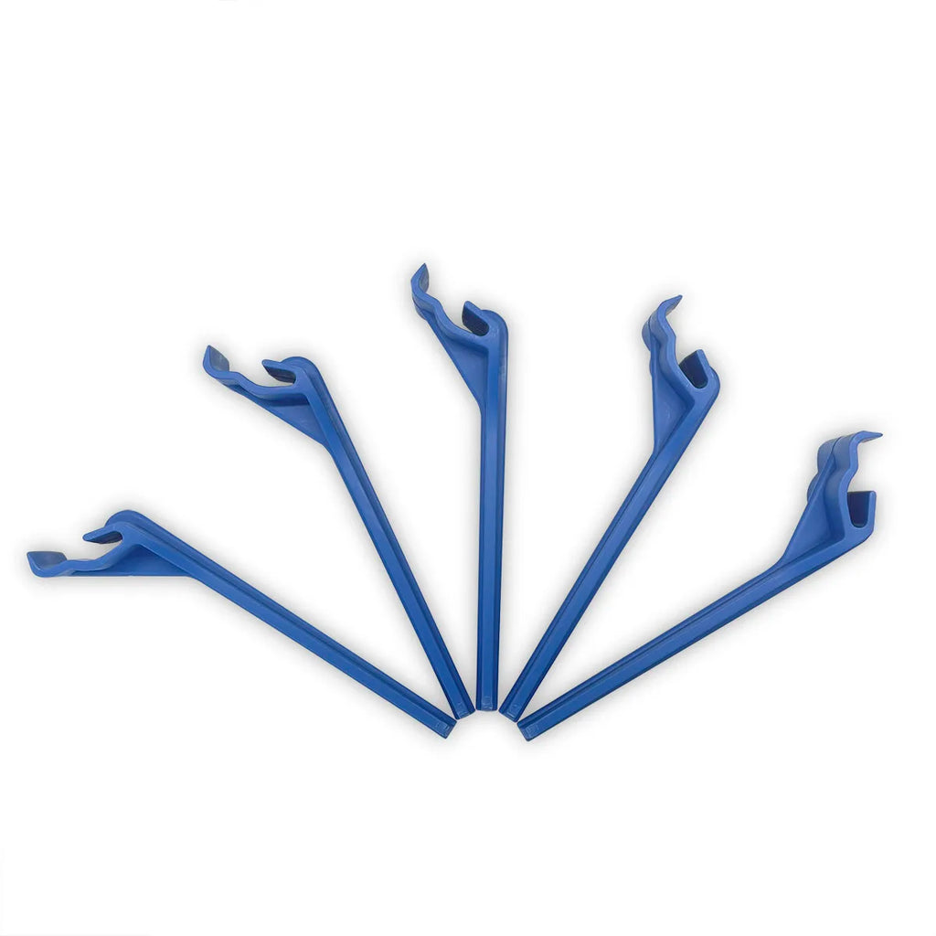 Sterilization tray holder with heat-resistant clips for autoclave tools