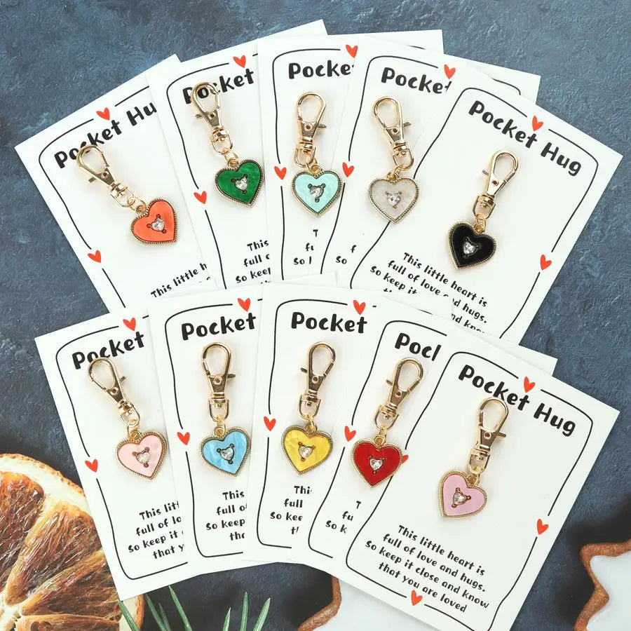 10 heartfelt keychain items, including a pocket-sized card with a message of affection, perfect as a gift.