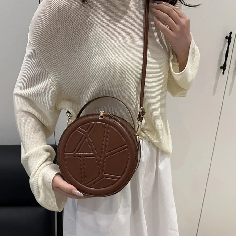 Solid color hand-held small round bag 2025 new bag, women's fashion shoulder bag, casual personalized crossbody bag