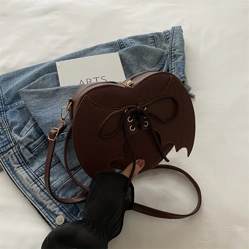 Korean-style Ins fashionable cute girl's bag 2026 new style simple small square bag personalized batwing shoulder messenger bag