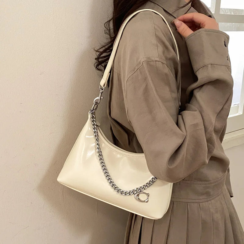 Retro and Simple Portable Jiaozi Bag Women's Spring 2026 New High-grade Textured Wild Shoulder Messenger Bag Gift for Girls.