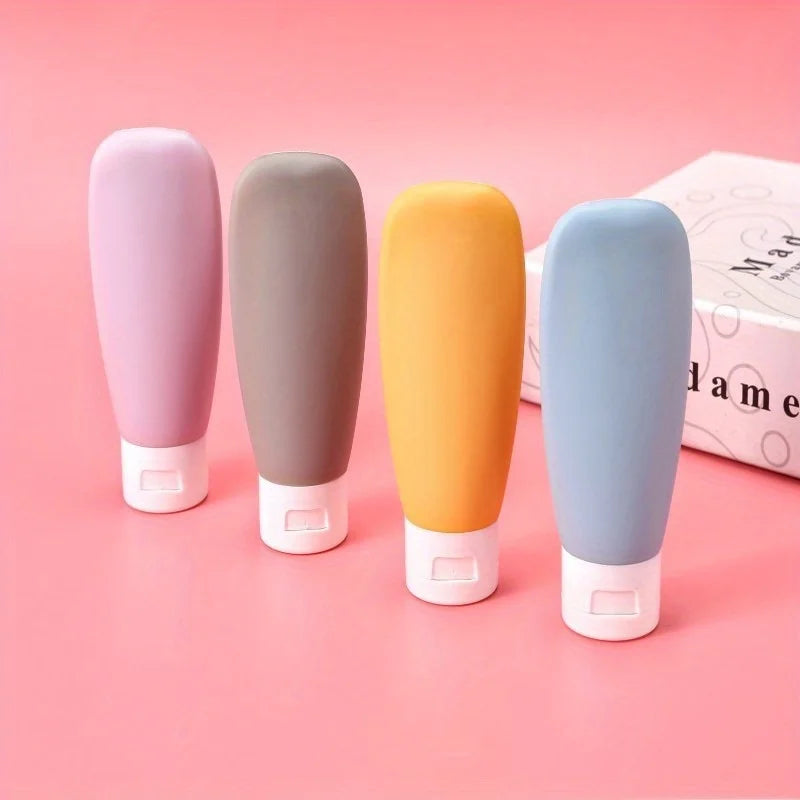 4pcs/set Travel bottle set, refillable cosmetic container, empty shampoo bath gel tube, shampoo and body lotion travel bottle