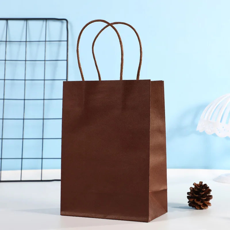 Wholesale kraft paper bags with Handle Custom Logo Cosmetic Clothing Packaging Bags Grocery Shopping Bags Gift Bags