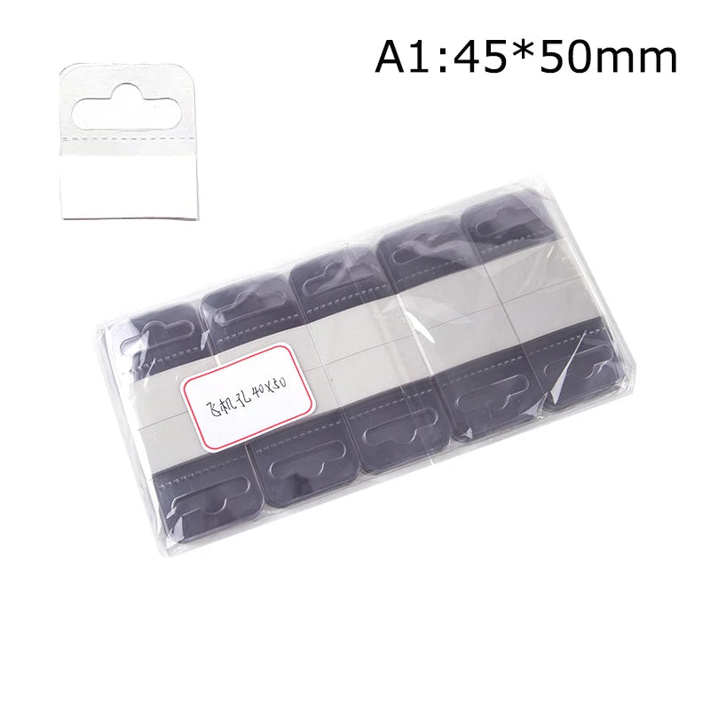 100 Pcs PVC Slot Hole Adhesive Hang Tabs Hook Merchandise Package Box Bag Hangers Peghooks Display For Store Retail Display