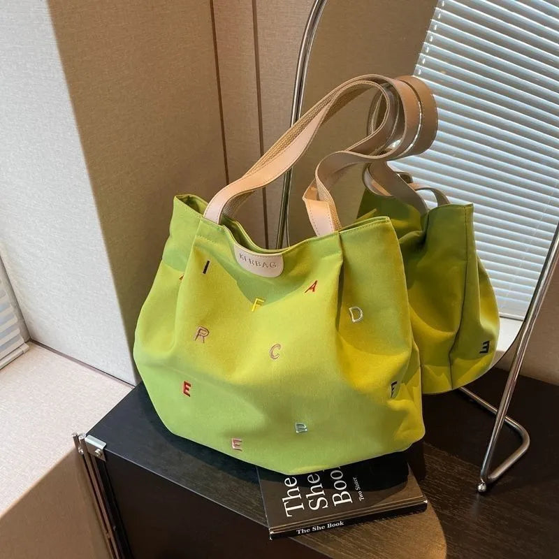 2025 New Canvas Bag Large Capacity Women's Trendy Embroidered Letter Tote Bag Small Fresh Student Shoulder Tote Bag