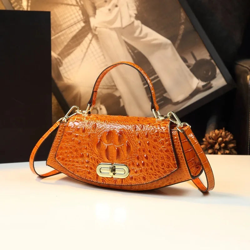 Women's saddle bag 2026, high-end leather small bag, new fashionable style, trendy and stylish, handheld messenger bag