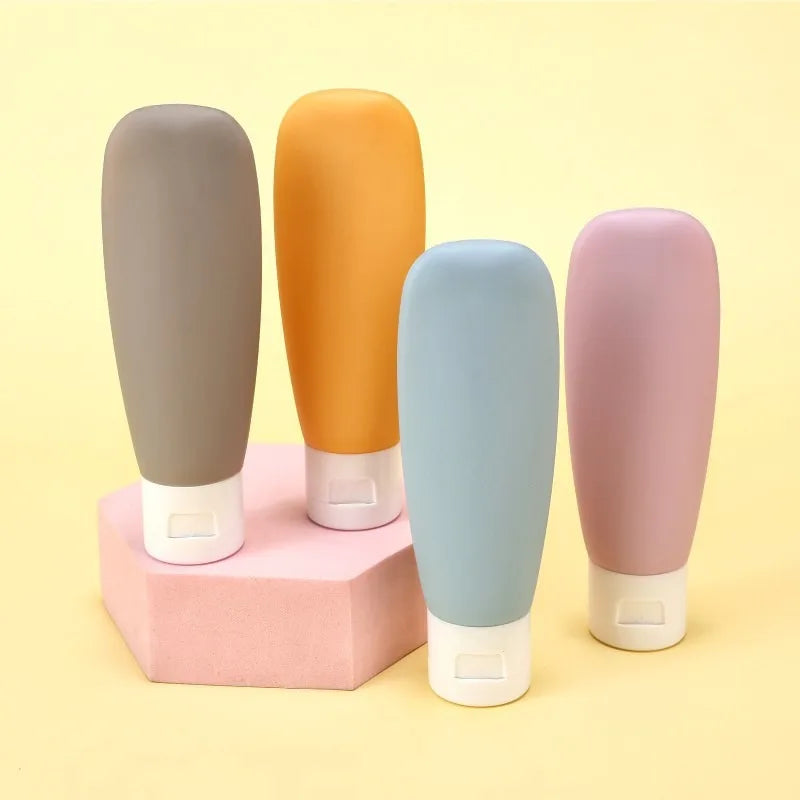 4pcs/set Travel bottle set, refillable cosmetic container, empty shampoo bath gel tube, shampoo and body lotion travel bottle