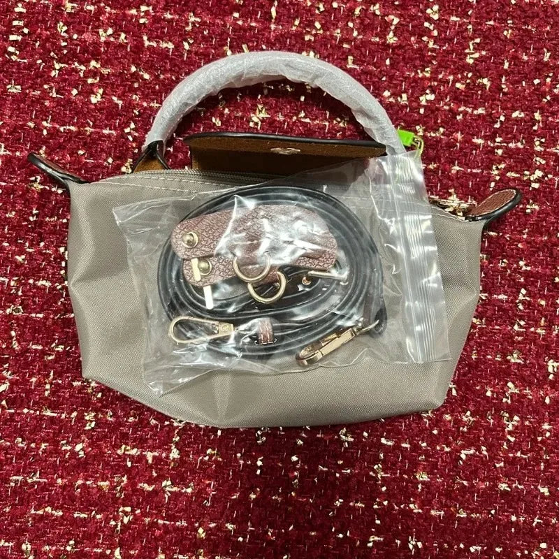 2026 Classic Women's Mini Dumpling Bag Waterproof Nylon Crossbody Phone Bag Single Shoulder Handbag Daily Travel Lightweight Bag