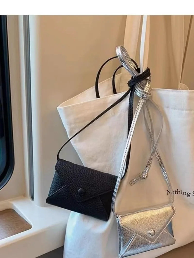 Compact and exquisite coin purse 2024 New mini crossbody bag, waist bag, neck-hanging small bag, card holder, pendant bag