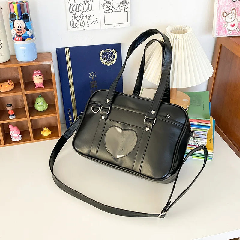 PU leather JK uniform single-shoulder heart large-capacity waterproof commuter crossbody bag for girls