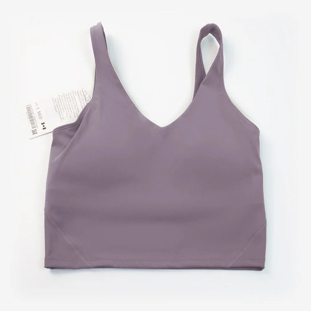 Women's yoga vest with U-shaped straps and built-in breast pads, offering a bare-skin feel suitable for fitness and exercise.