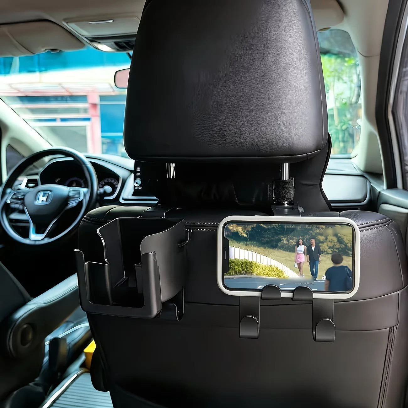 A 2-piece multi-functional car seat back storage bag, including a cup holder, a phone stand and a hook.