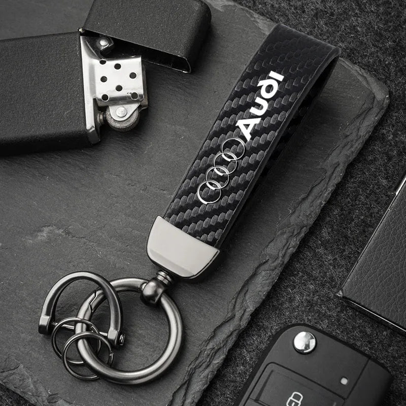 For Audi Sline A4 A3 A6 TT S4 S5 S6 A1 A2 A5 A7 A8 Q1 Q2 Q3 Q4 Q5 Q6 Q7 Q8 B8 B9 B6 C6 Q Carbon Leather Car Keychain Accessories