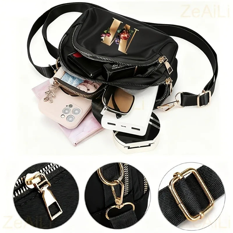 A fashionable women's messenger bag featuring a beautiful floral pattern with 26 letters, multiple compartments, and a large cap