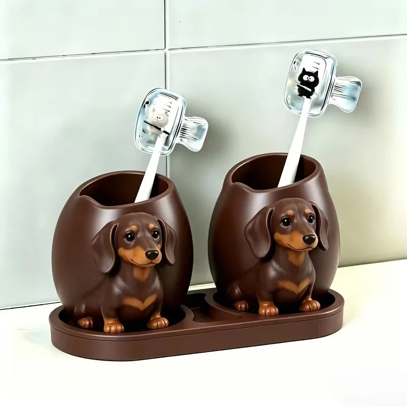 Two white cat toothbrushes and a black cat toothbrush holder, a household toothbrush holder protective cover
