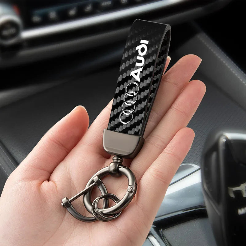 For Audi Sline A4 A3 A6 TT S4 S5 S6 A1 A2 A5 A7 A8 Q1 Q2 Q3 Q4 Q5 Q6 Q7 Q8 B8 B9 B6 C6 Q Carbon Leather Car Keychain Accessories