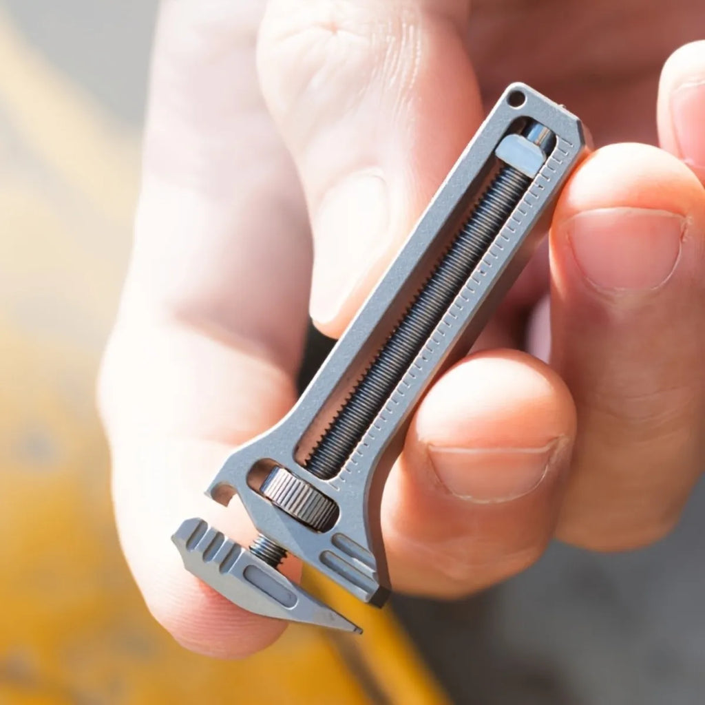 Multi functional mini wrench with window breaker, bottle cap opener, and screwdriver, compact industrial tool