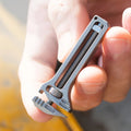Multi functional mini wrench with window breaker, bottle cap opener, and screwdriver, compact industrial tool