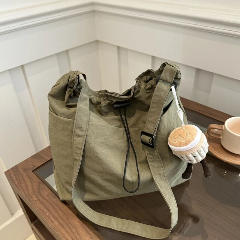 Stylish Drawstring Canvas Shoulder Bag with Adjustable Strap Pendant, Lightweight Casual Bucket Bags for Everyday Crossbody Bag