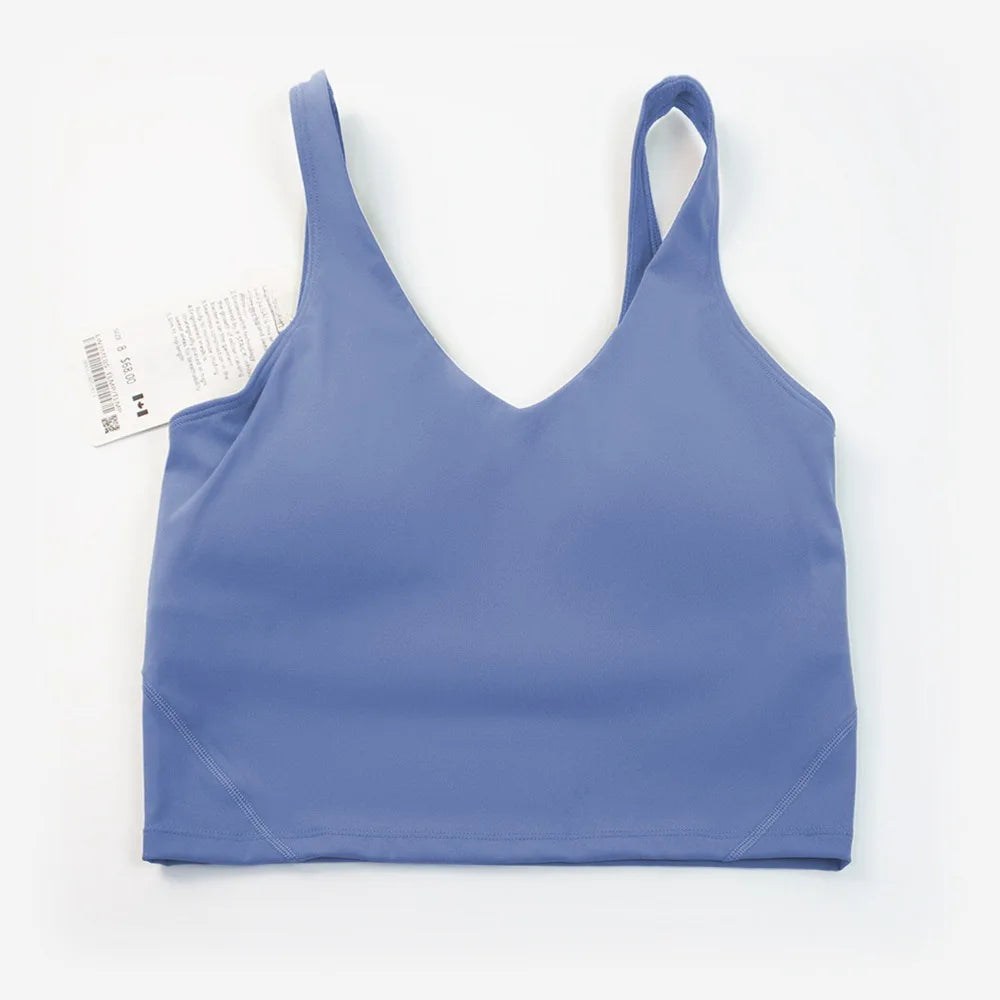 Women's yoga vest with U-shaped straps and built-in breast pads, offering a bare-skin feel suitable for fitness and exercise.