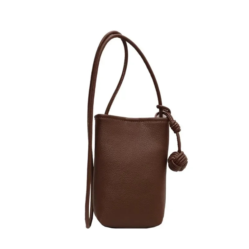 Versatile artistic small fresh small round ball pendant crossbody phone bag, soft leather cute mini bag for women