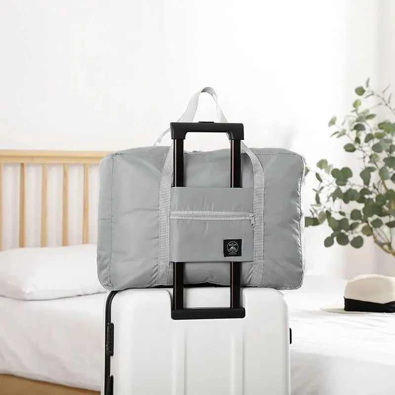 Fashionable Foldable Travel Bag: Large Capacity, Splash-Proof Carry-On Luggage Handbag for Unisex Fitness & Holiday Trips