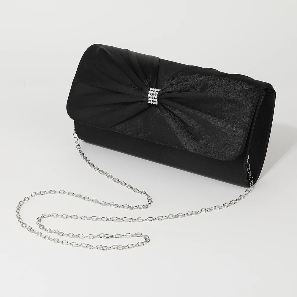 New high-end diamond-studded evening party handbag with satin finish, versatile for wedding and party wear.