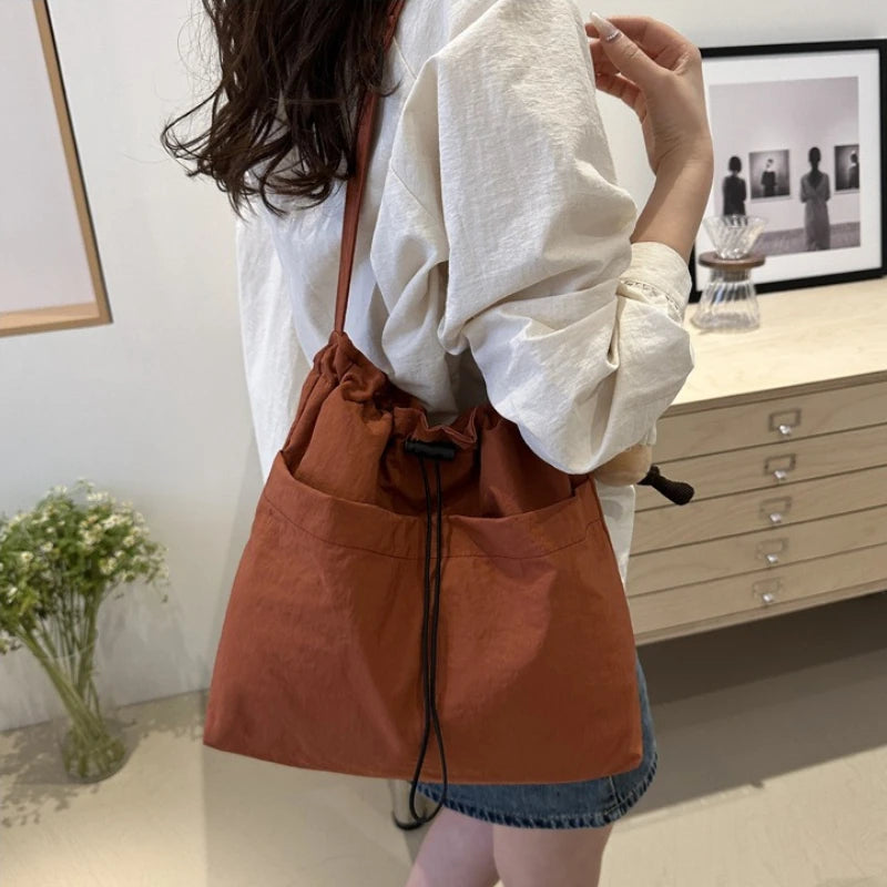 Stylish Drawstring Canvas Shoulder Bag with Adjustable Strap Pendant, Lightweight Casual Bucket Bags for Everyday Crossbody Bag