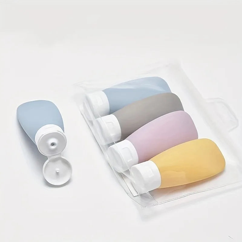 4pcs/set Travel bottle set, refillable cosmetic container, empty shampoo bath gel tube, shampoo and body lotion travel bottle