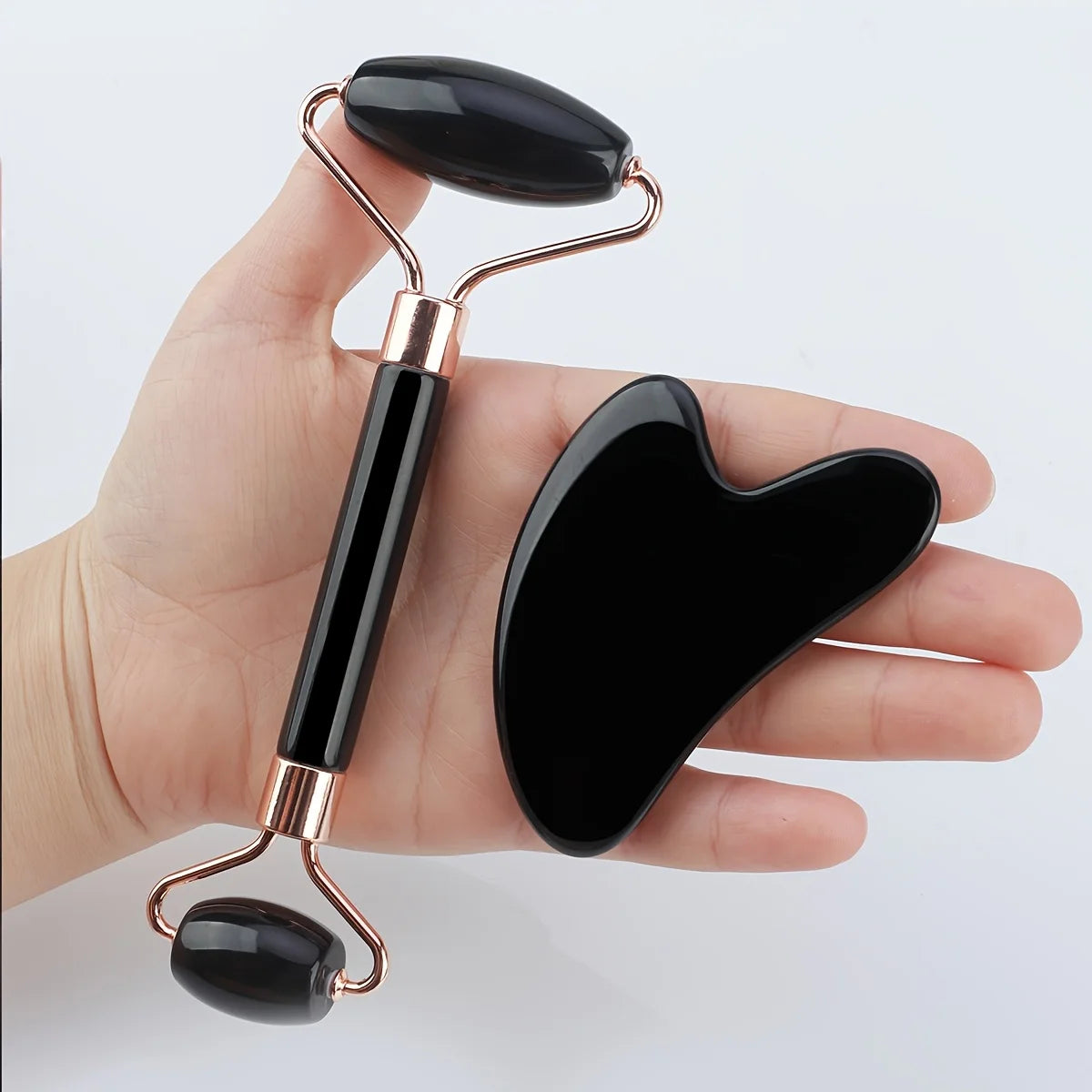 4-piece facial massage tool set, including roller massager, ice bead roller and scraping board, with a toiletry bag