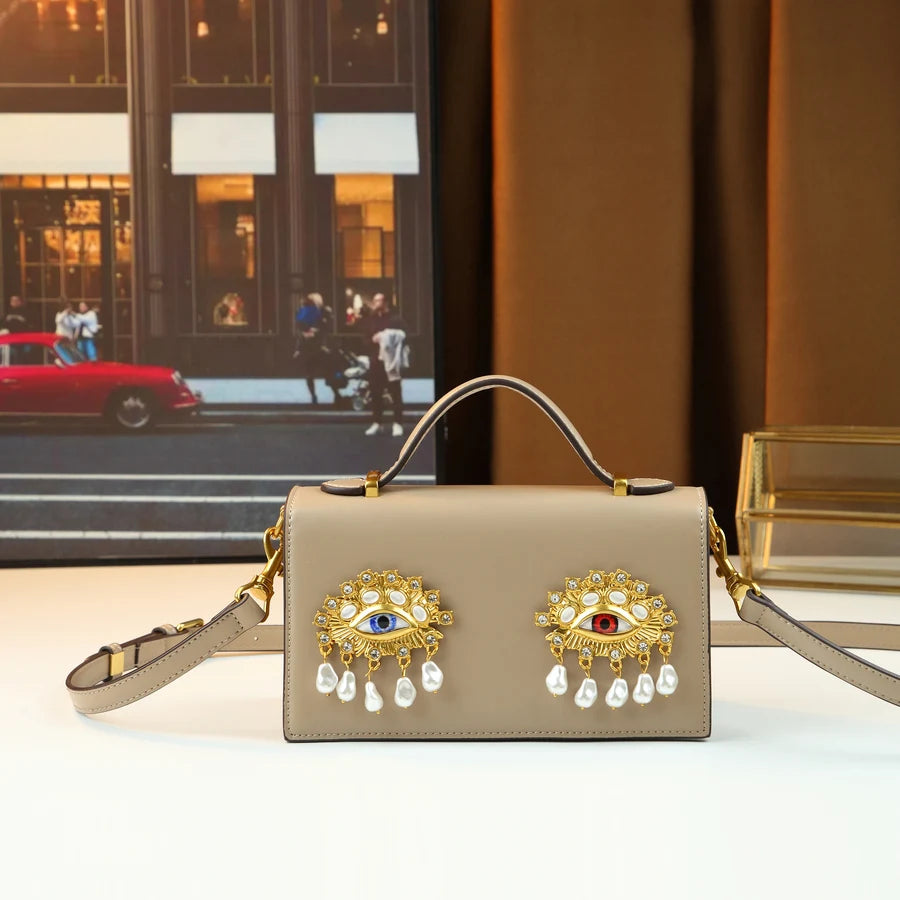 New retro pearl diamond eye creative design shoulder messenger bag fashion women's light luxury Boston bag