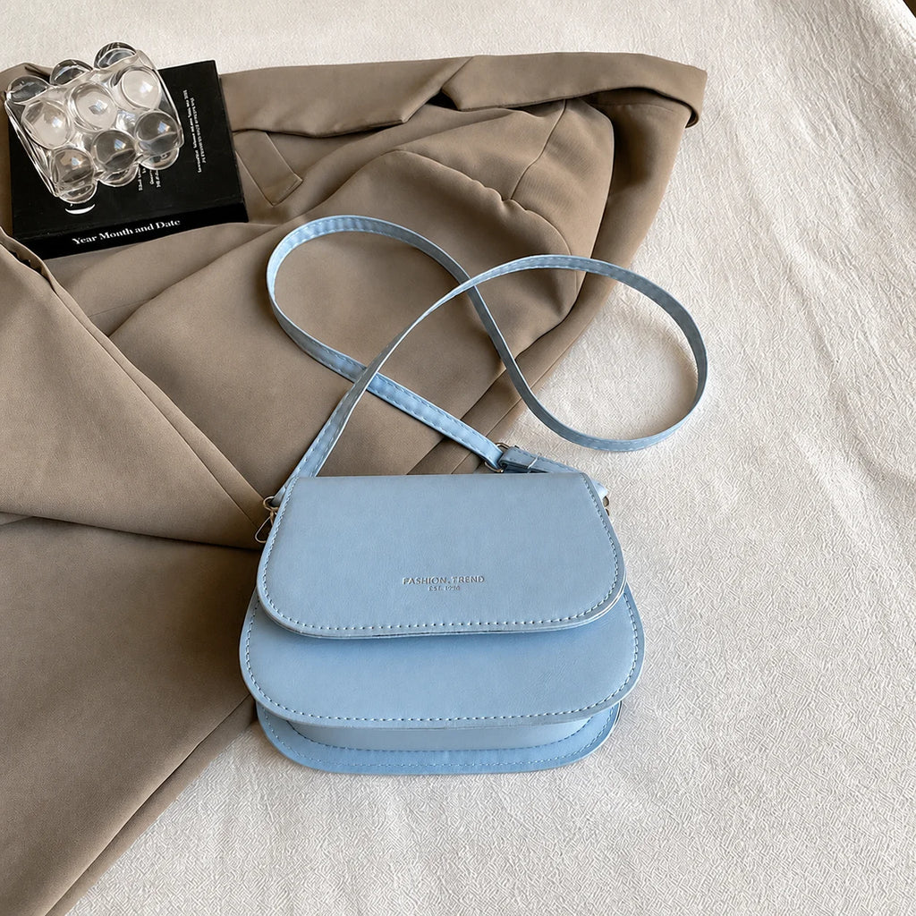 2026 New Fashion Saddle Shoulder Bag Women PU Leather Crossbody Bag Simple Solid Color Flap Messenger Bag Fashion Handbags Pouch