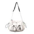 Fashionable Crossbody Bag with Drawstring Accent - Spacious & Secure Zipper Closure - Includes Stylish Bag Charm