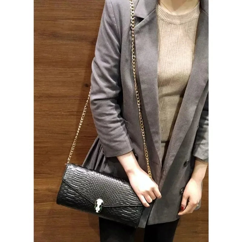 Women Snake Embossed Clutch Bag Elegant Jewelry Inspired Lock Luxury Chain Shoulder Bag 2026 Trend Envelope Party Evening Purse