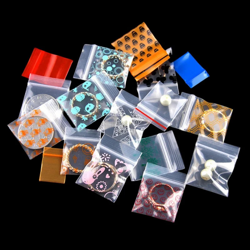 StoBag 100pcs Cartoon Transparent Mini Zipper Plastic Bags Small Sealing Jewelry Packaging Pouch Storage Waterproof Reusable