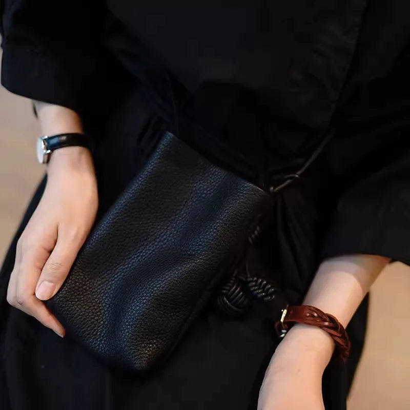 Versatile artistic small fresh small round ball pendant crossbody phone bag, soft leather cute mini bag for women