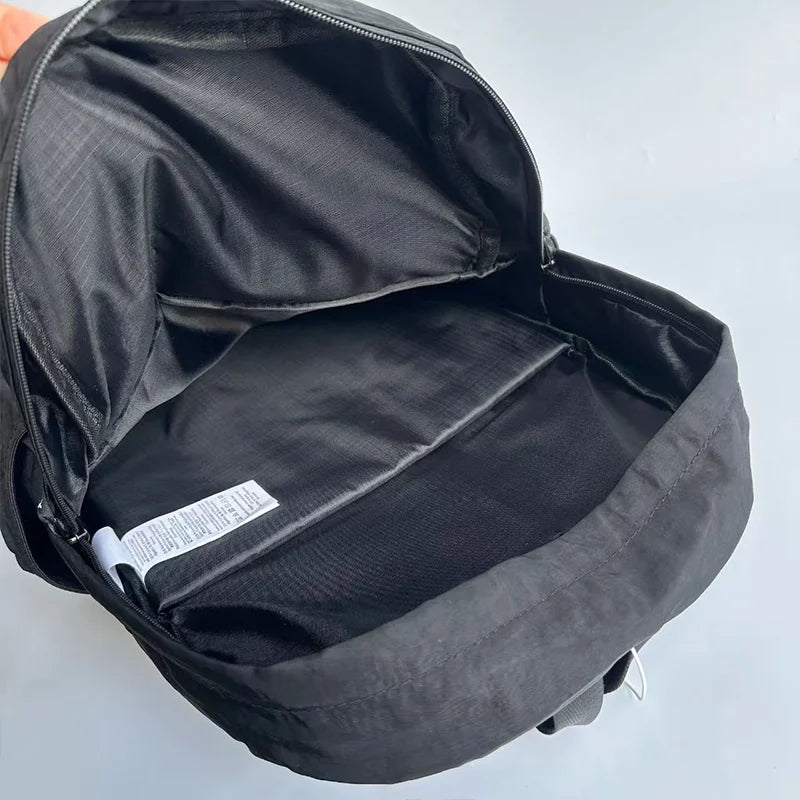 New Lightweight and Simple Backpack with Versatile Capacity for Travel, Casual Wear, Commuting, and Students (Unisex)