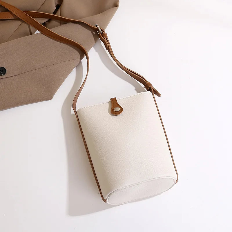 Cross border premium soft leather crossbody women's phone bag 2026 new commuting simple shoulder bucket bag small bag