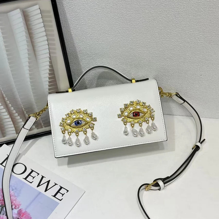 New retro pearl diamond eye creative design shoulder messenger bag fashion women's light luxury Boston bag
